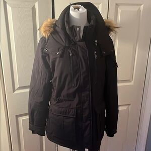 Brown and Black Ski Jacket with Fur Hood and Weather-Resistant Design